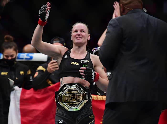 Valentina Shevchenko celebrates her TKO victory and title defense against Lauren Murphy during UFC 266 at T-Mobile Arena.